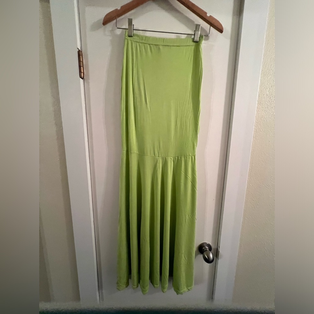 Long bright yellow skirt with flare at bottom